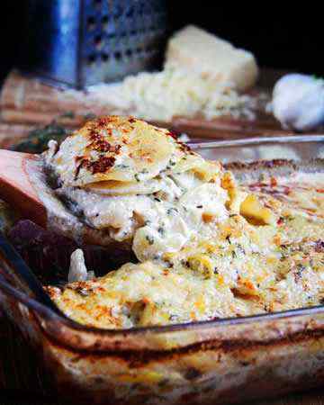 scallopedpotatoesbaconcreamonionsgruyereherbs